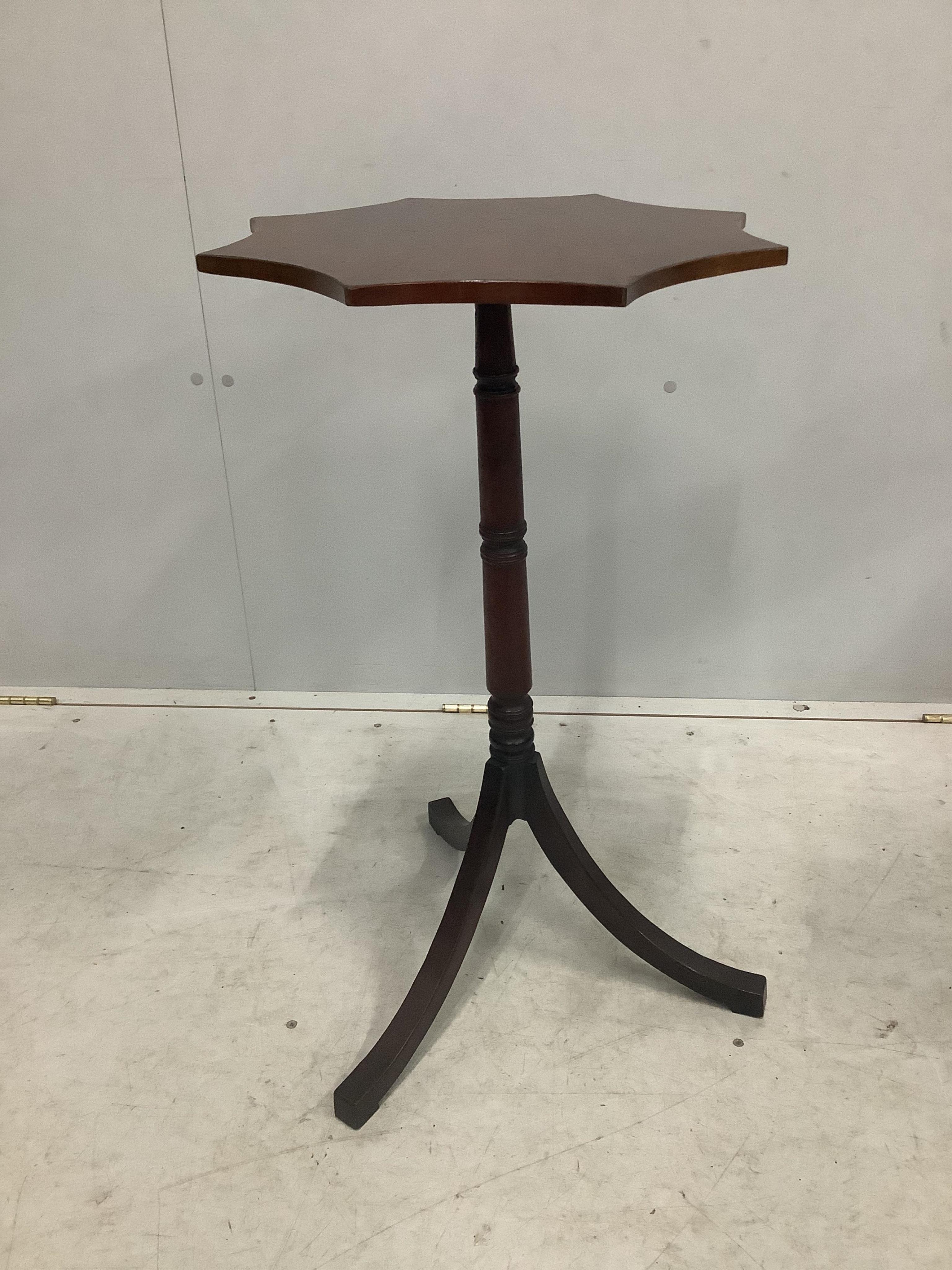 A pair of Regency style mahogany tripod wine tables, width 43cm, height 74cm. Condition - fair to good